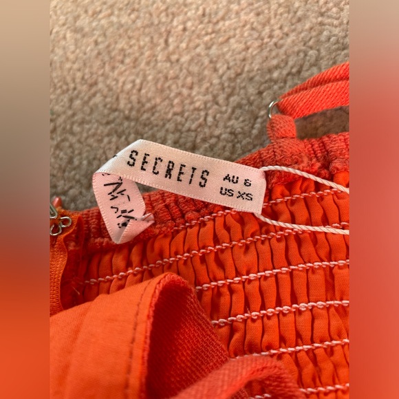 NWT Bright Orange Ruffle Romper, Size XS - Picture 8 of 10